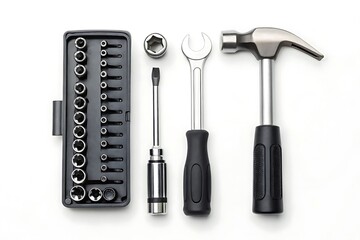 Fototapeta premium An organized set of essential hand tools including a hammer, wrench, socket set, and ratchet, isolated on white background, ideal for various repair and construction tasks