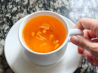 Cup of Chrysanthemum tea. Flowering tea. Herbal tea