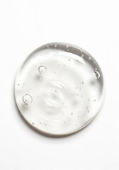 Clear cosmetic serum with tiny bubbles.