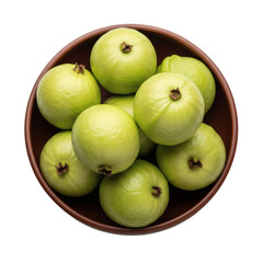 Bowl of fresh green and yellow guavas on black background
