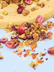 dried berries and fruits for tea on white background
