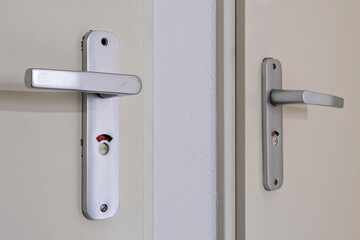 bathroom door handle showing occupied