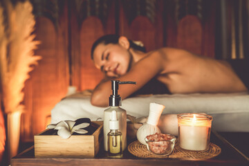 Aromatherapy massage ambiance or spa salon composition setup with focus decor candles and spa...
