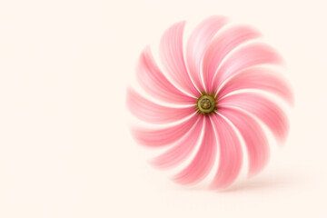 Rotating pink propeller with motion blur. Space for text.