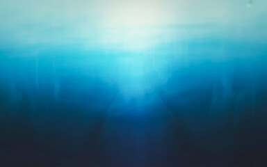 Obraz premium Abstract Underwater Blue Light Rays Background ocean