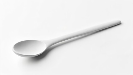 White spoon on white background