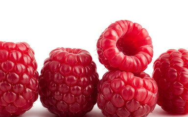 Close-up of Fresh Raspberries on White Background raspberry