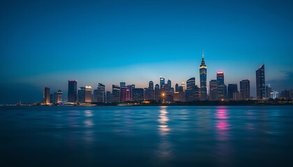 Obraz premium Futuristic city at night with blue lights a perfect birthday backdrop