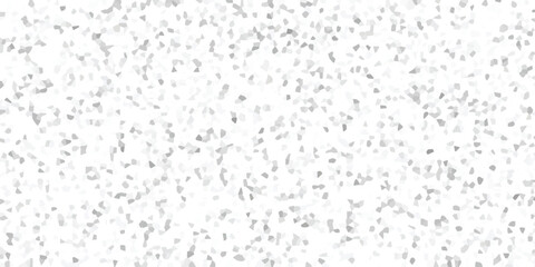 Abstract mosaic pattern with grayscale geometric shapes on a white background creates a textured design