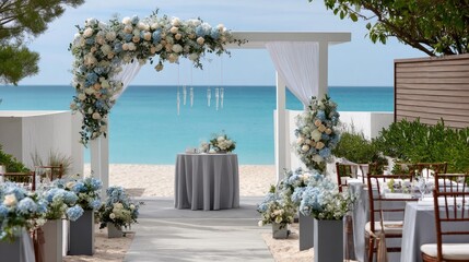 Beachside wedding pavilion blooms with blue and white flowers, creating a magical atmosphere for guests to enjoy stunning views