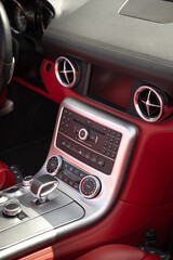 Photos of the interior of an expensive car, radio and gearbox
