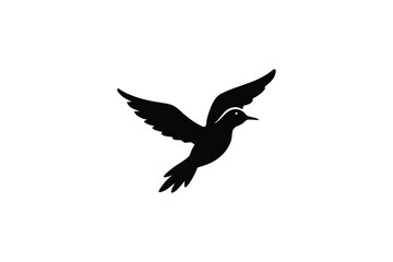Obraz premium A striking black silhouette of a bird in mid flight with wings spread wide against a clean white background symbolizing freedom and nature s grace silhouette