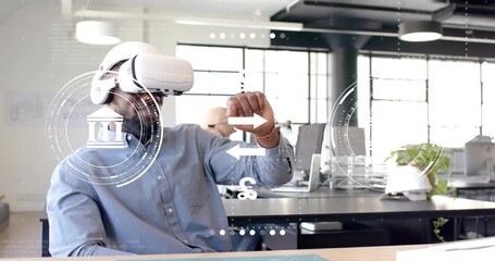 Male in VR headset raising hand and pinching causing currency interface scrolling in finance demo - Powered by Adobe