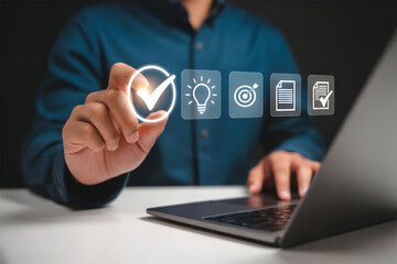 Businessman Selecting Digital Checklist Icon for Idea, Target, and Task Completion &ndash; Project Planning Concept