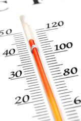 Thermometer measuring high temperature during summer heatwave