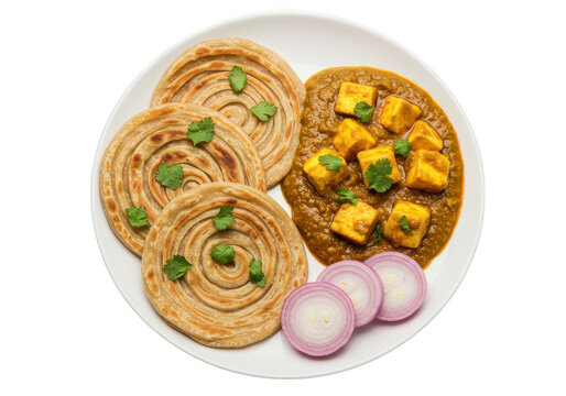 A top view of lachha paratha with paneer butter masala and onion slices on a white plate, garnished with cilantro on transparent background