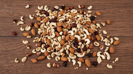 Scattered Nuts and Dried Fruits on Wooden Background