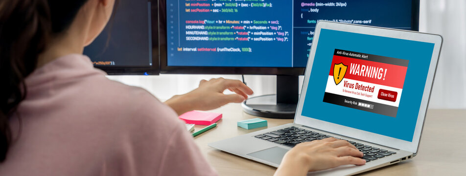Virus warning alert on computer screen detected brisk cyber threat , hacker, computer virus and malware