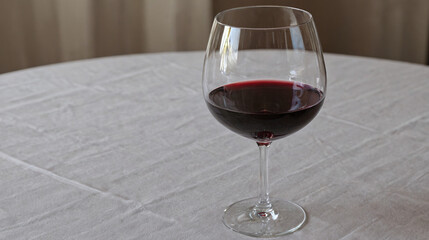 Glass of red wine on an elegant table