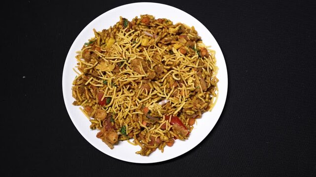 Delicious north and south indian street food bhel puri with sev and papdi	