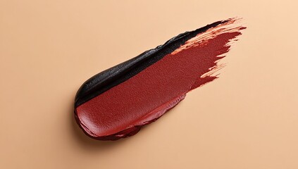 Black oil liquid on a red background, a top view of a beauty product swatch with black and coral lipstick brush strokes. A close-up macro shot of a makeup smudge. A beauty texture background.