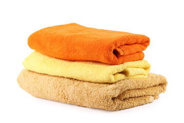 Stack of soft towels isolated on white
