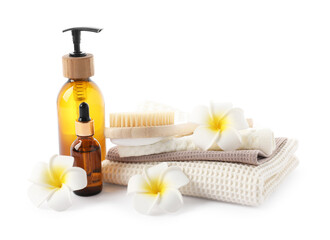 Spa composition with waffle towels and cosmetic products isolated on white