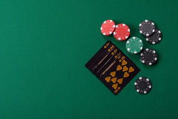 Playing card game poker in casino with chips, bets and risk. Cards and chips