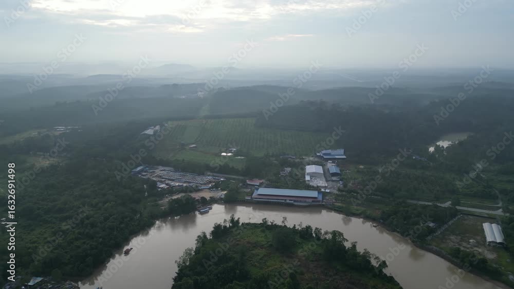 Poster a river is flowing through a valley with a bridge in the middle. the bridge is surrounded by trees a