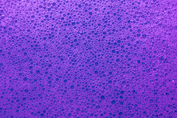 Vivid foam texture with colored bubbles in pastel hues, creating a soft and modern aesthetic for...