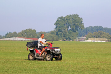 Man riding a quad bike