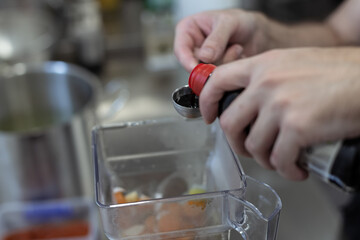 Chef Preparing Colorful Vegan Salad Bowl and Olive Oil Drizzle Photography - Action Shot, Healthy Cooking - Professional Kitchen, Vegan, Sustainable Ingredients