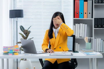 Work Overload: An office worker grapples with overwhelming tasks, embodying stress and exhaustion...