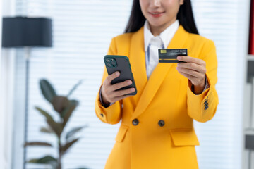 Online Payment with Ease: A businessperson showcases the simplicity of online transactions, with a...