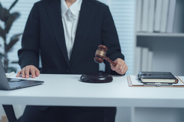 Legal Verdict: A focused legal professional, meticulously dressed in a formal suit, presides over a...