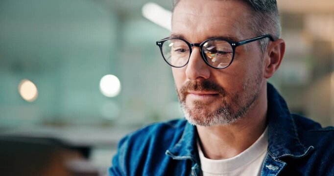 Business, man or laptop in office at night for system design, writing code or software development. Developer, mature person or thinking with glasses reflection for solution process or ideas for HTML
