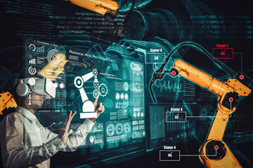 Engineer controls robotic arms by augmented reality industry technology application software. Smart...