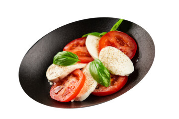 Caprese salad mozzarella and tomato, basil fresh delicious gourmet food background on the table rustic food top view copy space keto and paleo diet vegan and vegan food