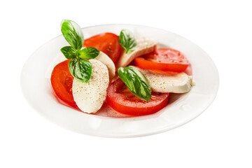 Caprese salad mozzarella and tomato, basil fresh delicious gourmet food background on the table rustic food top view copy space keto and paleo diet vegan and vegan food