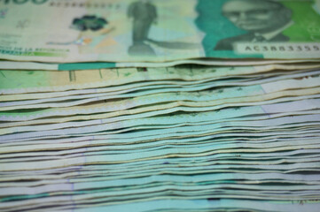 Stack of Colombian 100000 pesos bills background