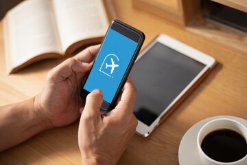 Find cheap flights online using travel apps on mobile phone and tablet devices now