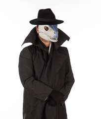 man in dinosaur mask on white background