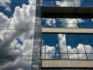 clouds reflected in windows
