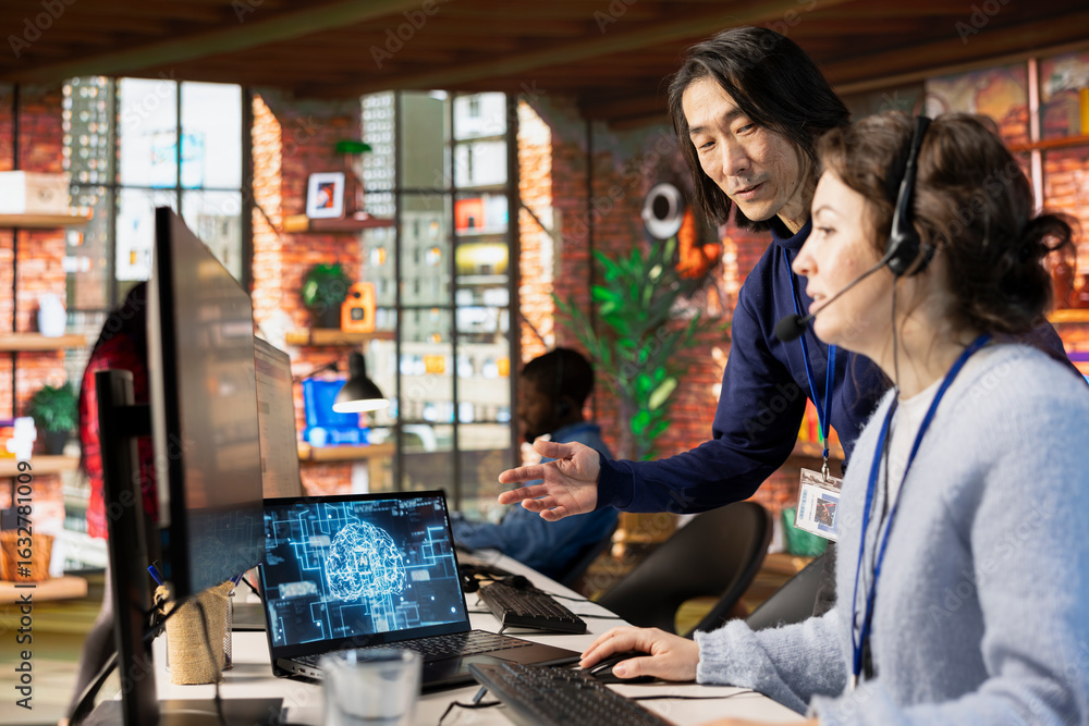 Poster call center onboarding specialist providing training to new agent on helpful ai tools. manager in cu