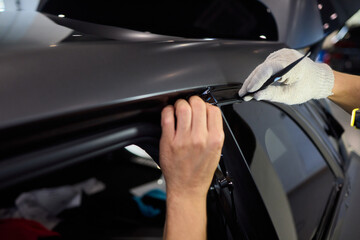 Applying a Protective Film on the Surface of Your Car for Enhanced Durability and Shine