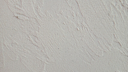Close-Up of Rough Textured Plastered Wall in Neutral Beige Tone