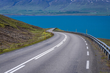 Asphalt road on the Vikurskard mountain pass near Akureyri city in the north part of Iceland