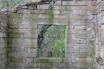 window in stone wall
