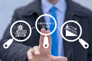 Emergency response preparedness plan concept. Business person using virtual touch screen sees the inscription: EMERGENCY PLAN. Learn and prepare in emergency situation. Emergency Training.