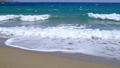 Fototapeta premium Turquoise waves on sandy beach